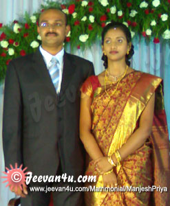 Manjesh Priya Marriage Photos at St Thomas Cathedral Palai